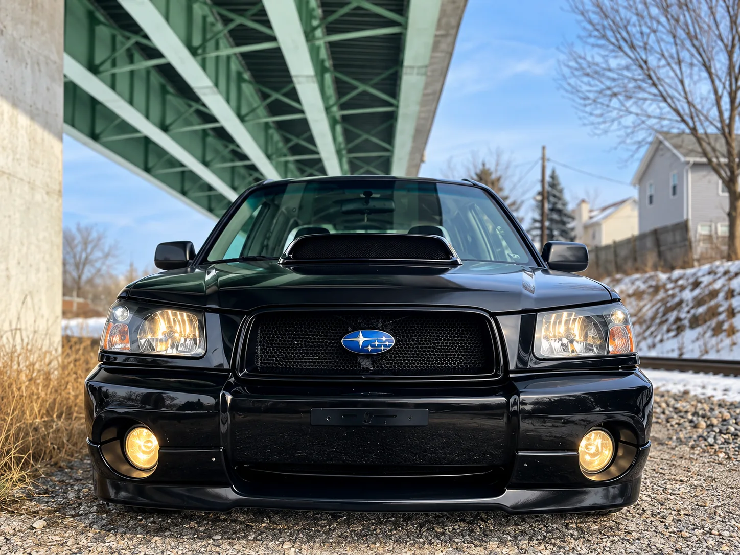 Black Subaru Forester front view